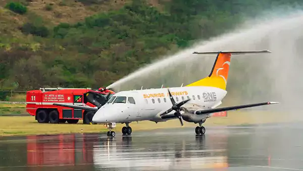 Sunrise Airways at St Kitts with water salute. Sunrise Airways at St Kitts with water salute.