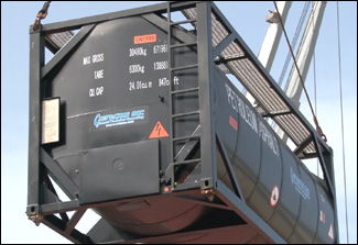 Petroleum Storage Tank Being Lifted By Crane
