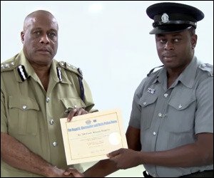 Police Commissioner Liburd and PC Huggins