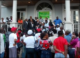 A Crowd Gathers To Hear Trial Results