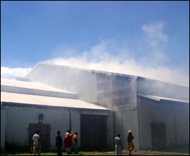 Smoke Billowing From Ram's Supermarket