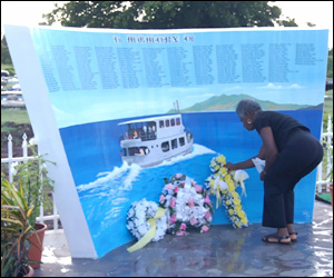 Laying Wreaths at The MV Christena Memorial