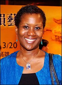 Ms. Jasmine Elise Huggins - Charge d'Affaires