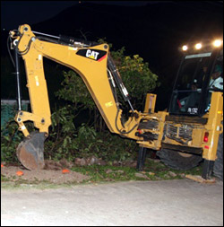 Nevis' Minister Daniel On Backhoe