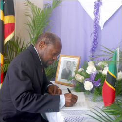 PM Douglas Signs Condolence Book