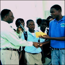 Michael Webbe Shakes Hands On Donation