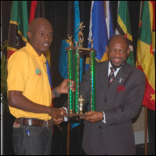 Zepherinus Joseph Receives Trophy From PM Douglas